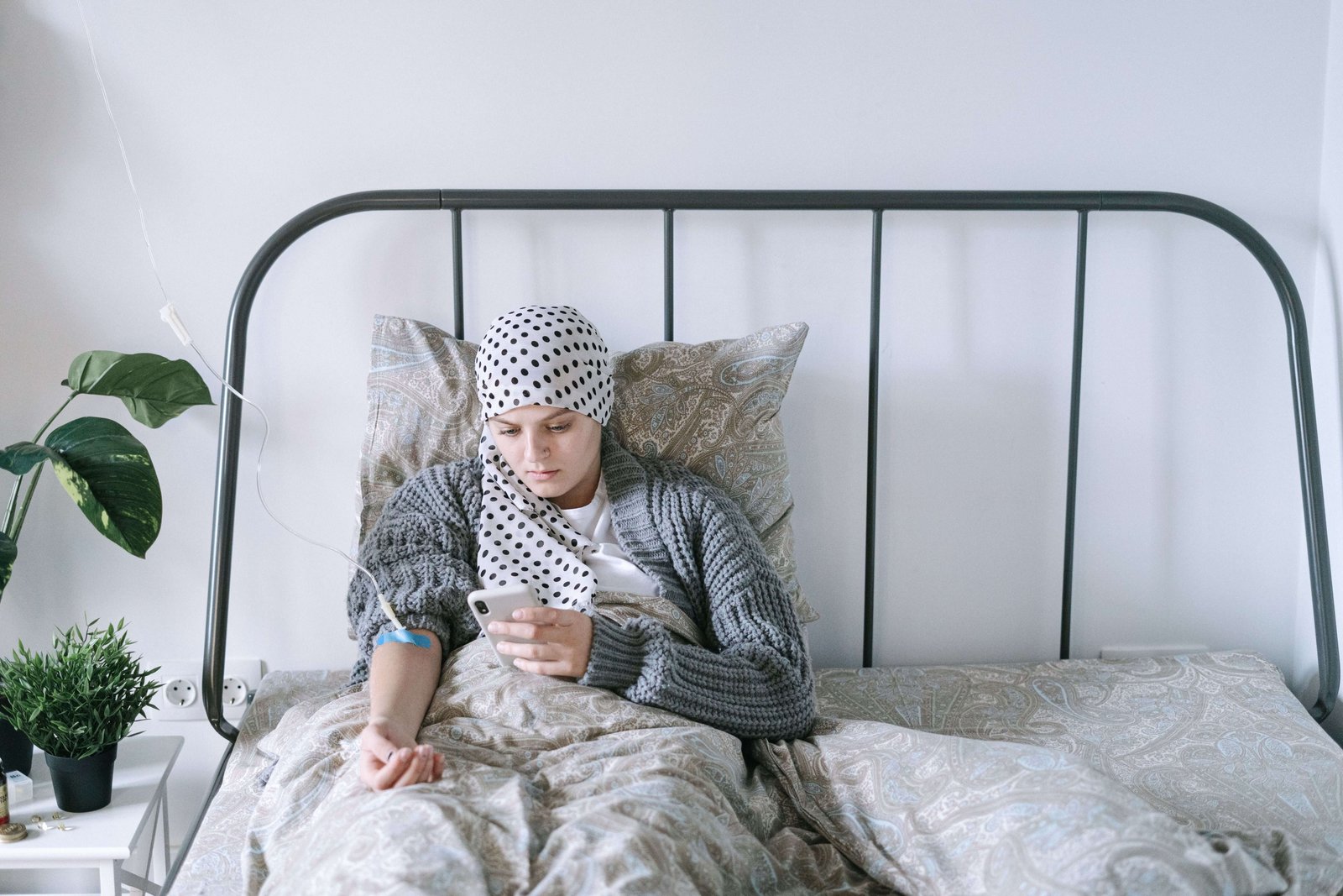 Person resting in bed during recovery