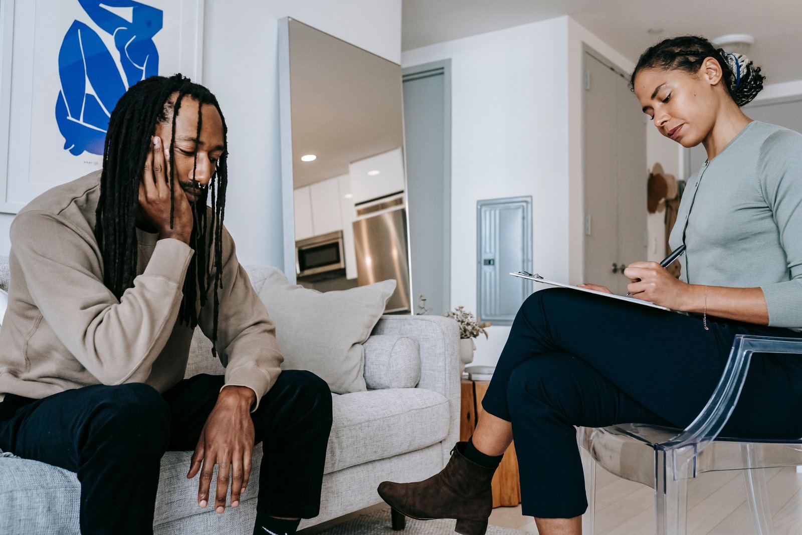 Individual with belongings transitioning into housing